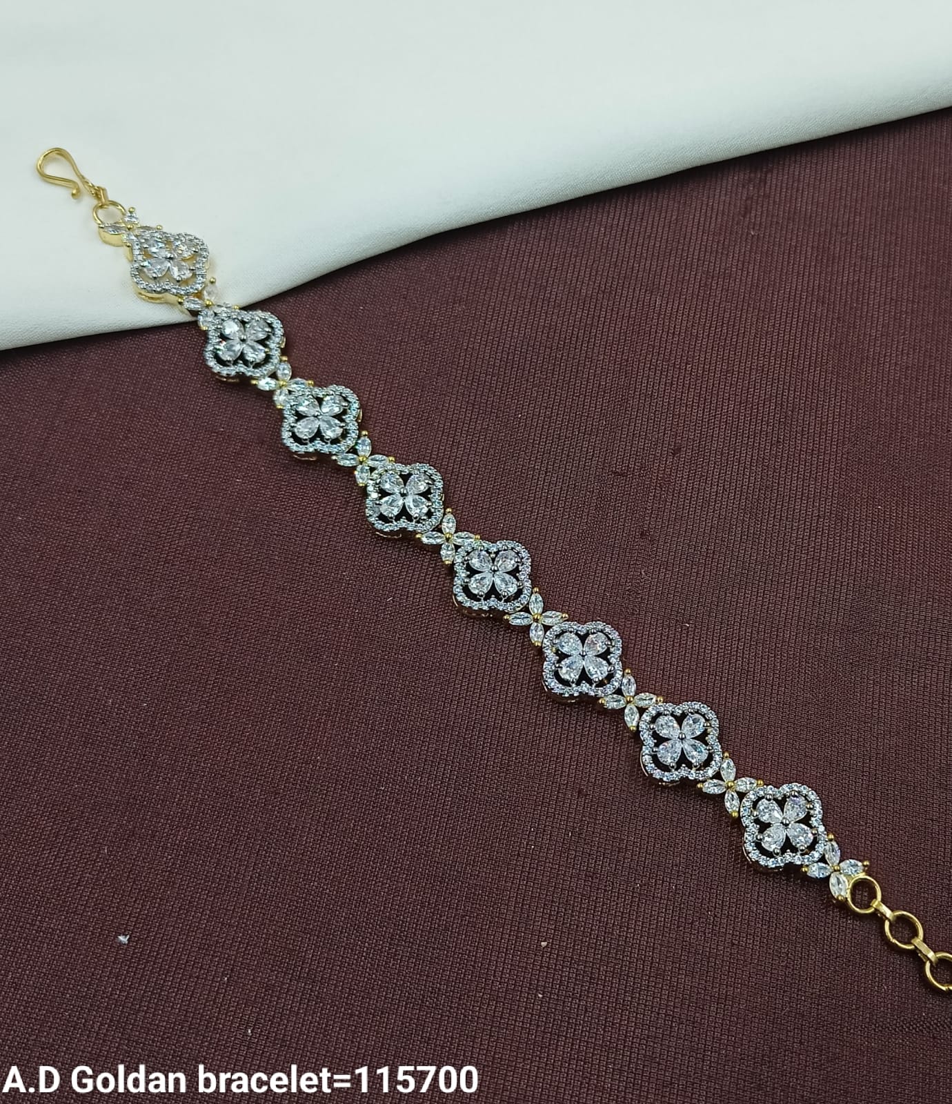 Elegant A.D. Golden Floral Bracelet – Sparkling Diamond-Cut Design